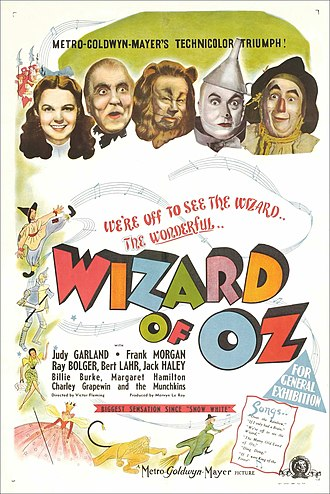 poster for The Wizard of Oz (1939) boasting MGM technicolor with a colorful mix of illustrations of the witch, lion, scarecrow, and cast