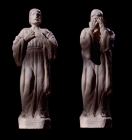 Jesus statuette covering its eyes (screenshot from Airplane!, time stamp 0:53:03)